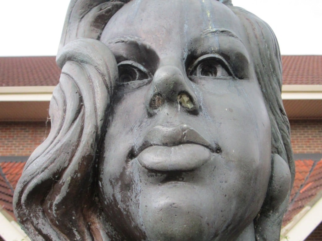 Close up face of diana dors statue
