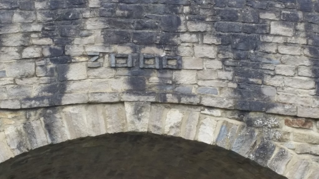 stone bridge with 2000 on it