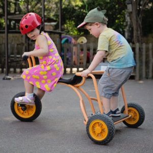 two children on a bike 