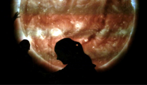 Swindon’s Festival of Tomorrow Returns for 2022 - child in front of an exhibit showing the surface of the sun, from the University of Central Lancashire.