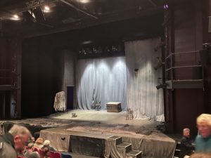The stage setting of the woman in black at the Wyvern