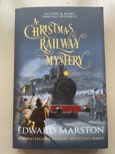 Front cover of a book called 'A Christmas Railway Mystery' ny Edward Marston
