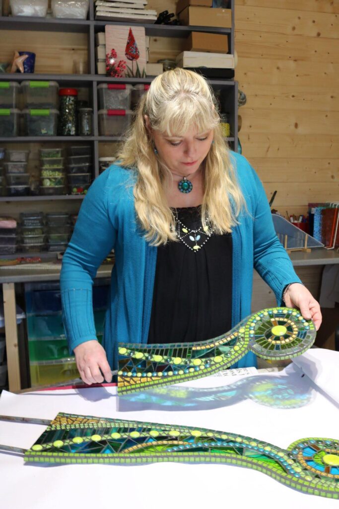 Jacquie Primrose with mosaic in studio