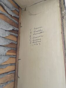 1930s builder's names left on the wall