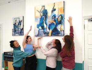Sarah, Vicky, Maille and Jan-Ming admiring Sheryll’s painting ‘Connections’. The painting features three of the dancers. It drew its inspiration from the ‘Making Connections’ inclusive monthly movement sessions that they attend at Swindon Dance.