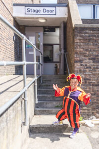Interview with Ben Goffe - Ben outside the Wyvern Theatre in costume as Muddles the Jester