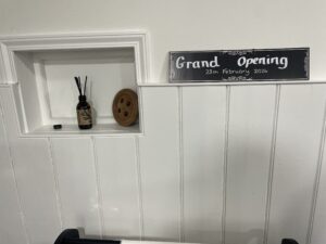 Grand opening date of tina mason millinery