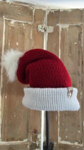 Santa type knitted hat from Tina Mason millinery in Swindon