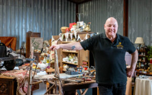 BLUE LIGHTS TO BRIGHT IDEAS - Mike Rees inside his shop warehouse
