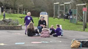 YOUTH ART CLUB EXPANDS - Kevin Bray with schoolchildren