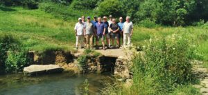 Daniel's Well in Public Hands - Daniel's Well Clapper Bridge - representatives of groups involved in the purchase of the well