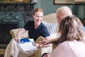 Making Finance Accessible for Women - Jenny talking to man & woman