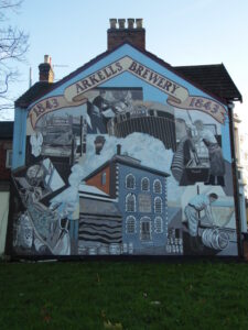The Arkell's mural on County Road painted in 1985 by Sarah Faulkner - this photograph dated 2017