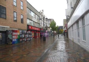 Fleet Street and Fleet Square - a view down a wet Fleet Street towards the railway station and Fleming Way
