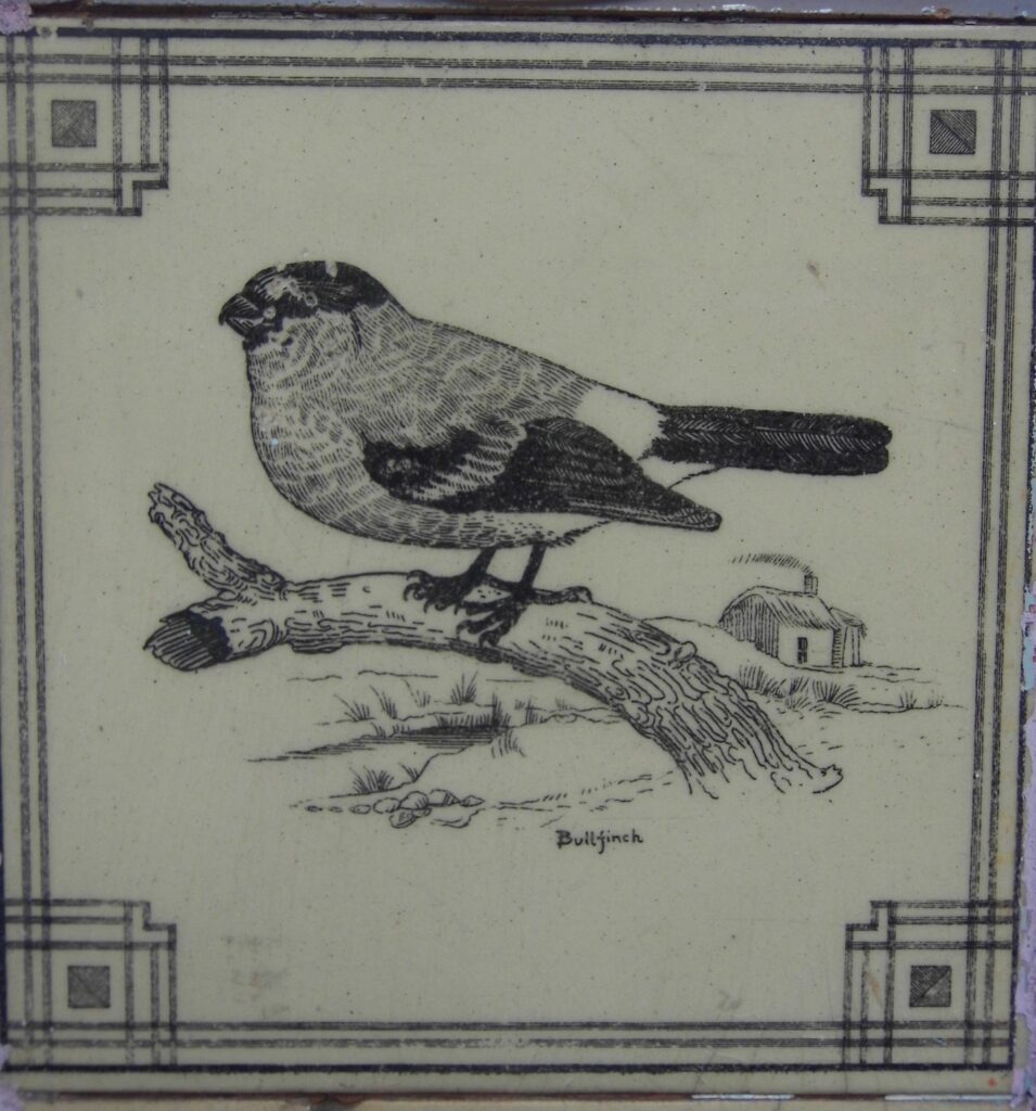 Tile bird on branch