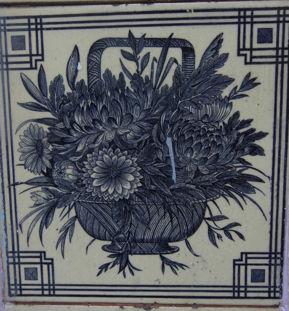Tile basket of flowers
