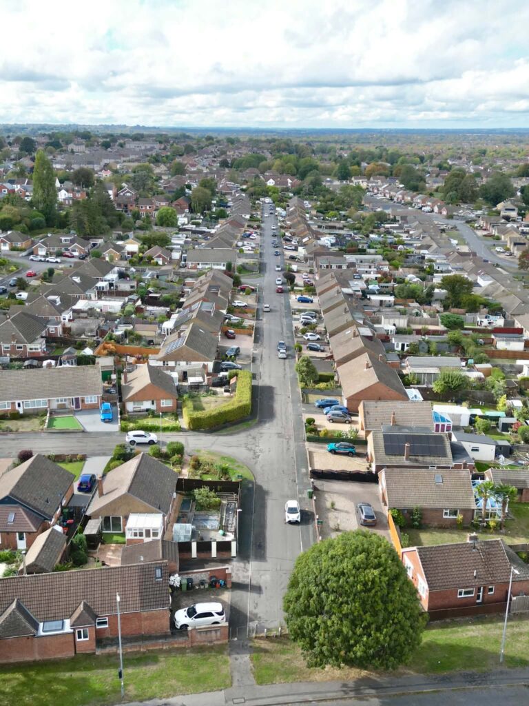 The other length of the Broadway running up the centre of the picture